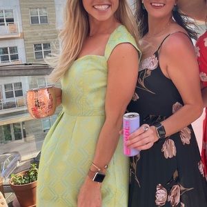 bright patterned blue and green pocketed dress